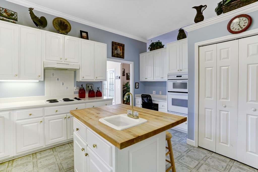 18 Foxfire Court Hayesville, NC 28904 - Photo 24 of 41 a kitchen with a sink a stove and cabinets