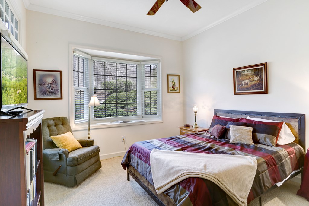 18 Foxfire Court Hayesville, NC 28904 - Photo 26 of 41 a bedroom with bed and a couch
