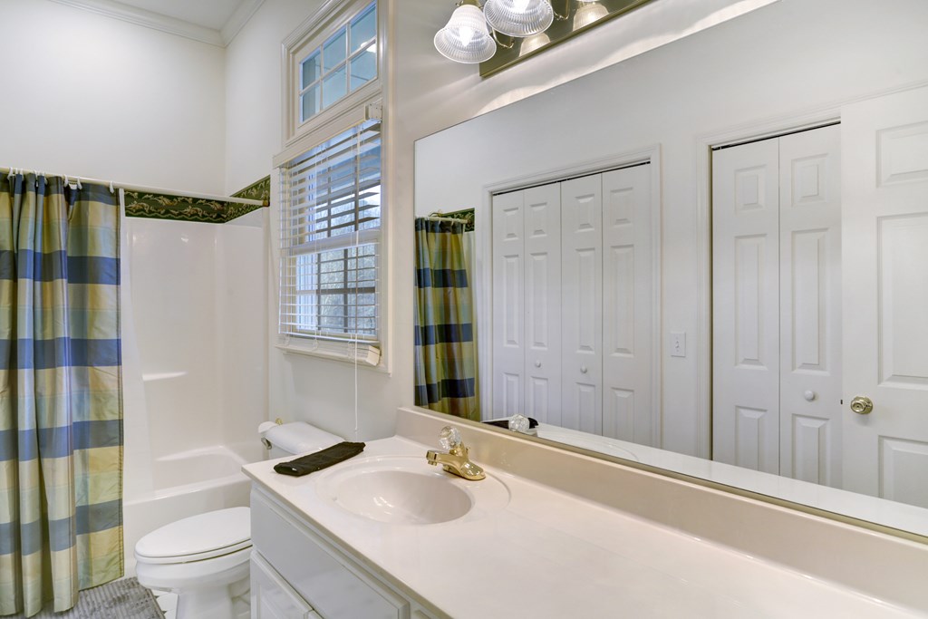18 Foxfire Court Hayesville, NC 28904 - Photo 27 of 41 a bathroom with a sink toilet and shower