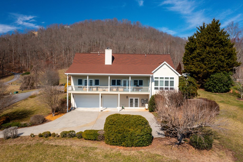 18 Foxfire Court Hayesville, NC 28904 - Photo 3 of 41 a front view of a house with a yard