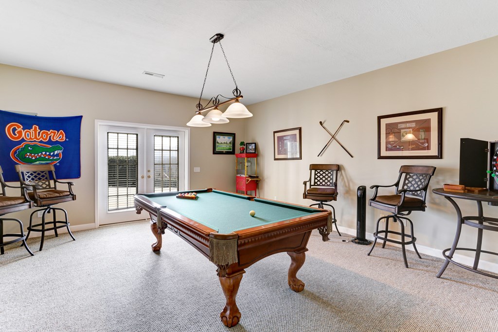18 Foxfire Court Hayesville, NC 28904 - Photo 38 of 41 a room with chandelier pool table and windows