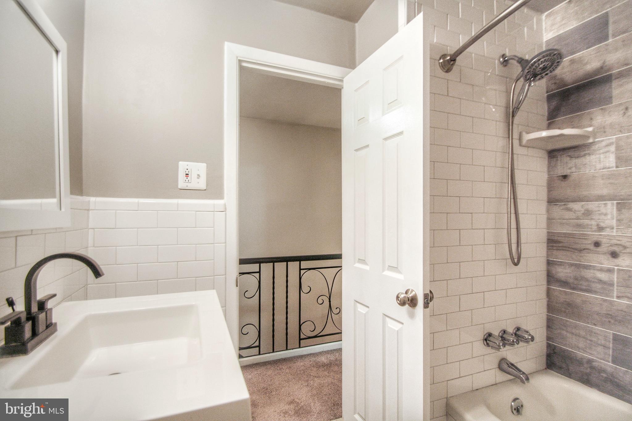 7448 Brockton Road Philadelphia, PA 19151 - Photo 29 of 35 Hall Bathroom
