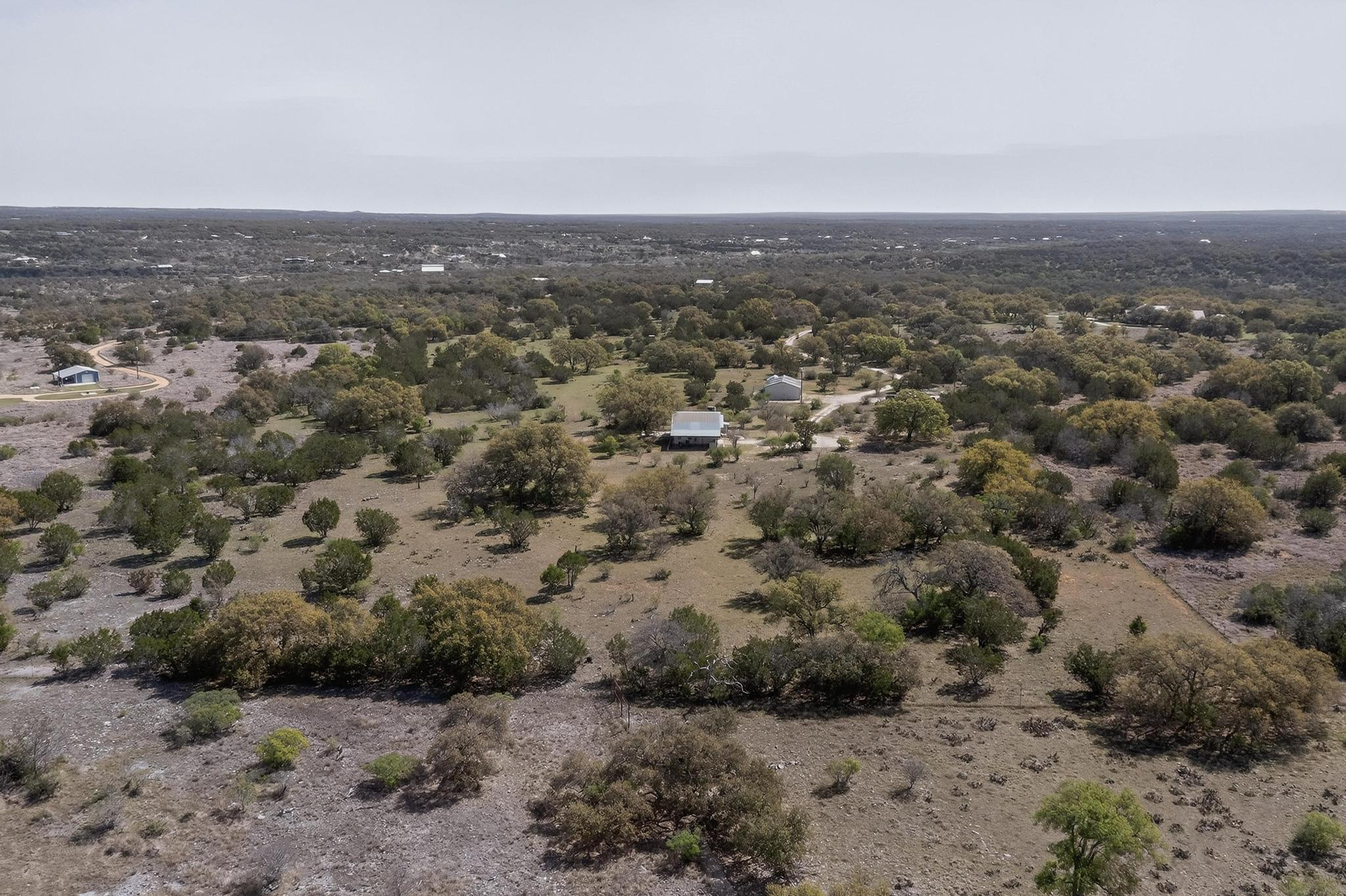 1619 Althaus Ranch Road Johnson City, TX 78636 - Photo 11 of 40 an aerial view of multiple house
