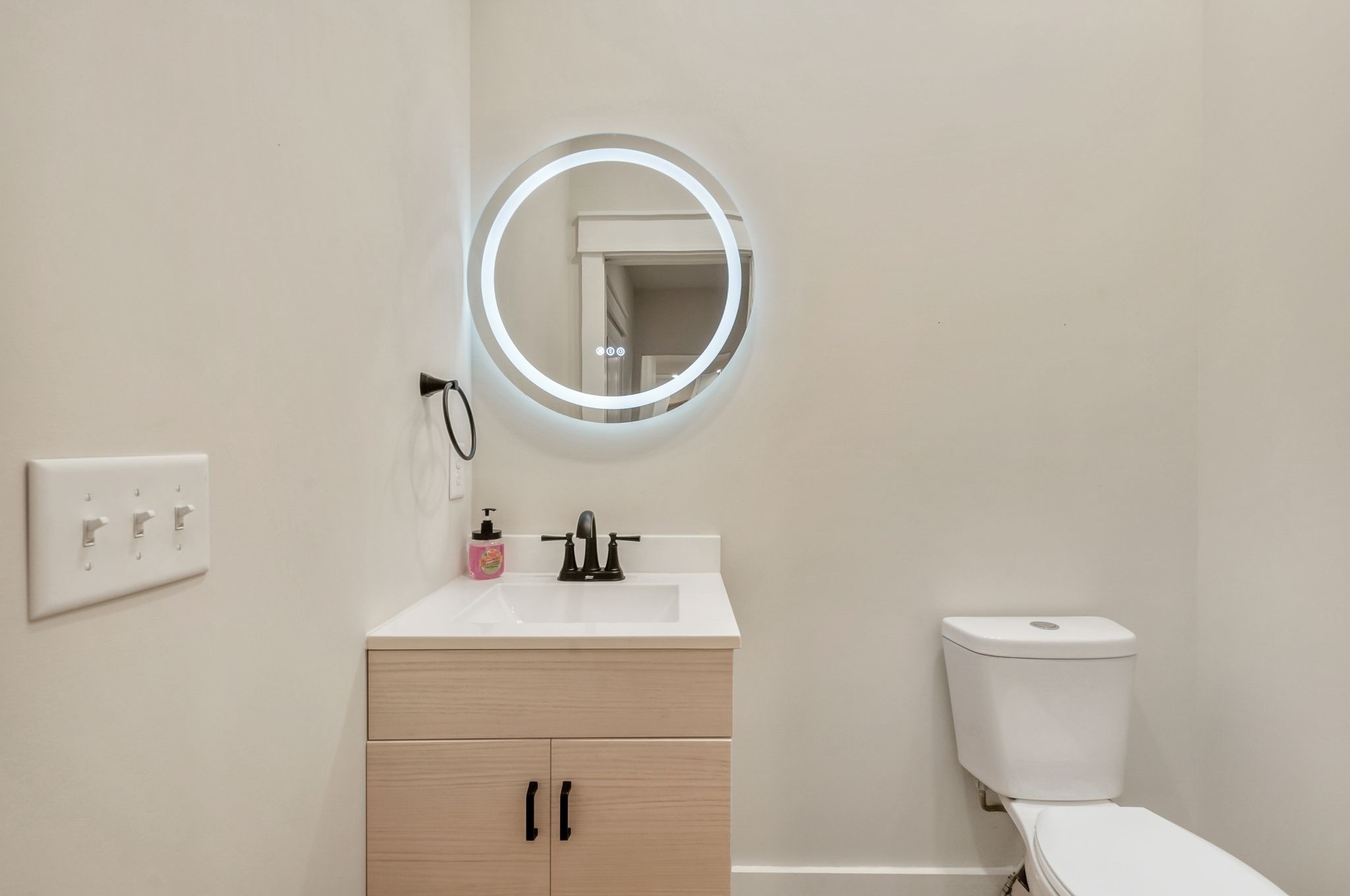 2005 Beaver Ridge Road White Bluff, TN 37187 - Photo 22 of 39 a bathroom with a toilet a sink and mirror