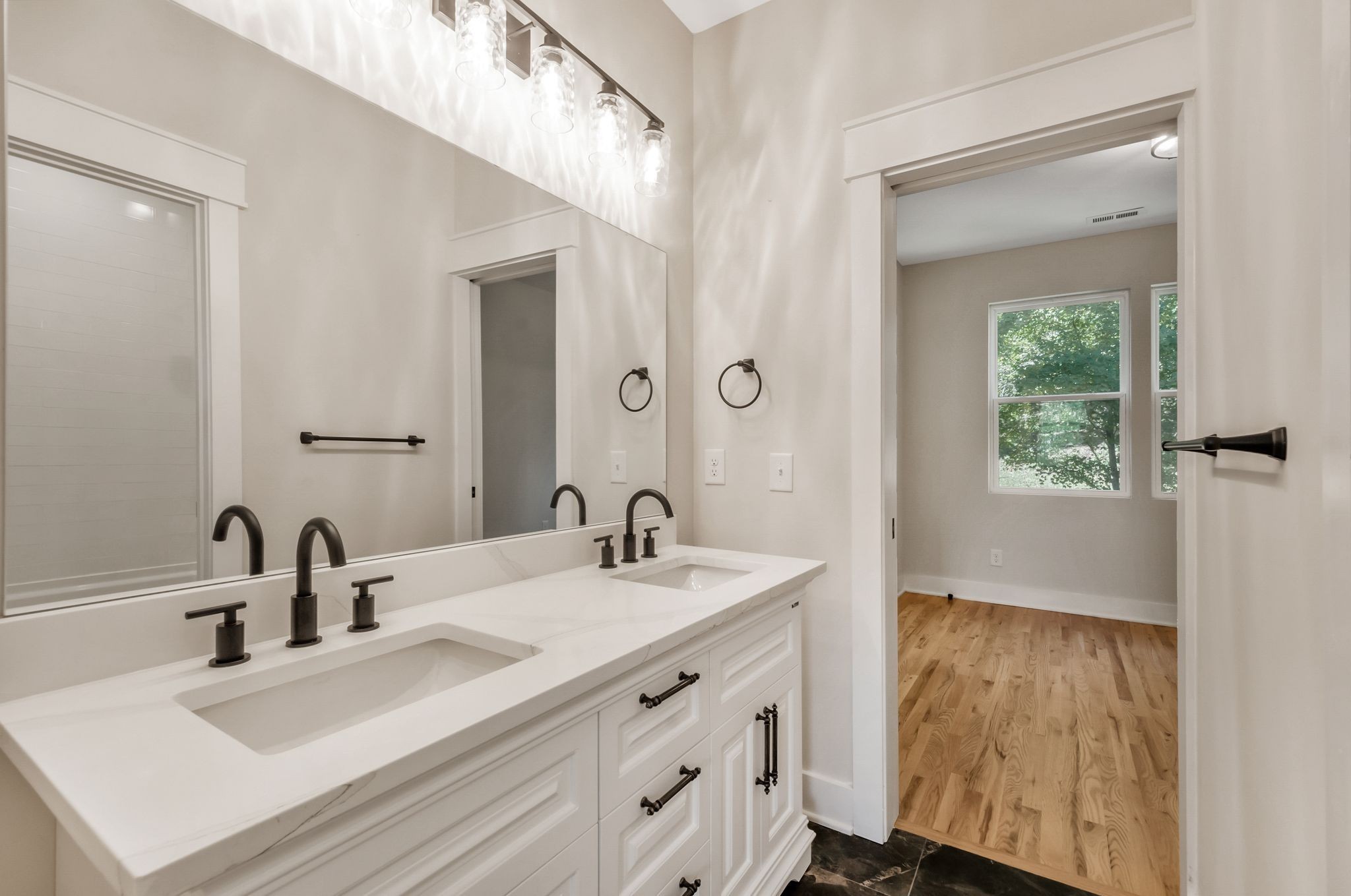 2005 Beaver Ridge Road White Bluff, TN 37187 - Photo 29 of 39 a bathroom with a sink and a mirror