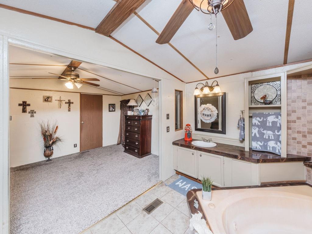 196 Perch Road Bowie, TX 76230 - Photo 12 of 30 a view of a room with gym equipment