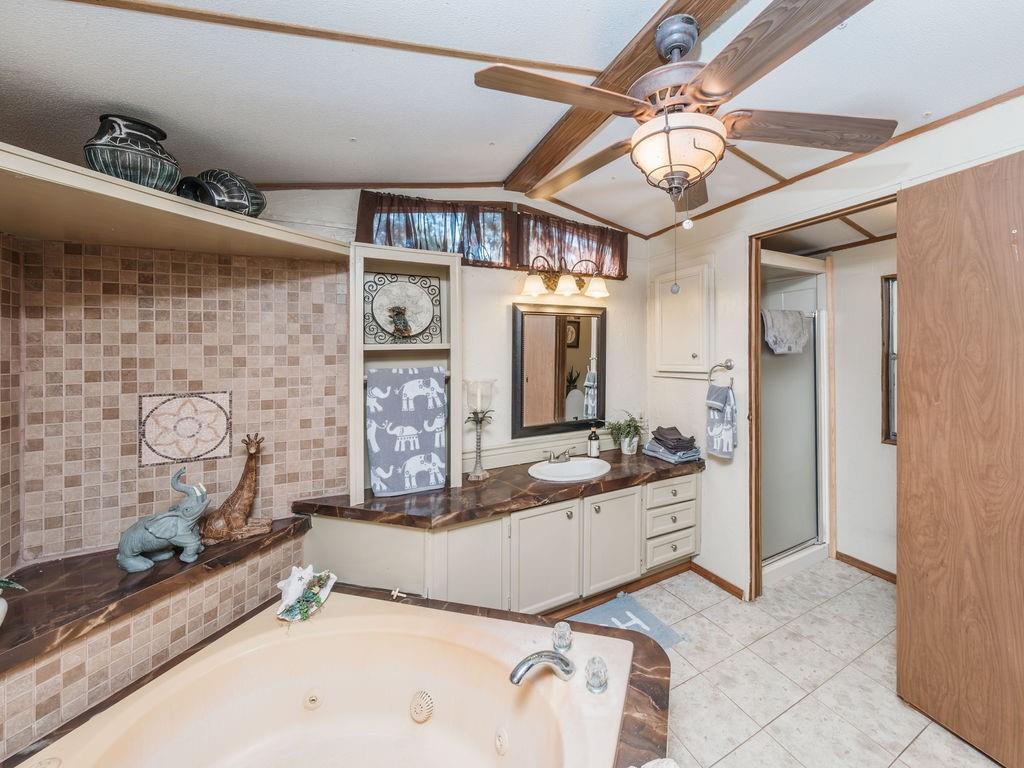 196 Perch Road Bowie, TX 76230 - Photo 13 of 30 a view of a storage & utility room
