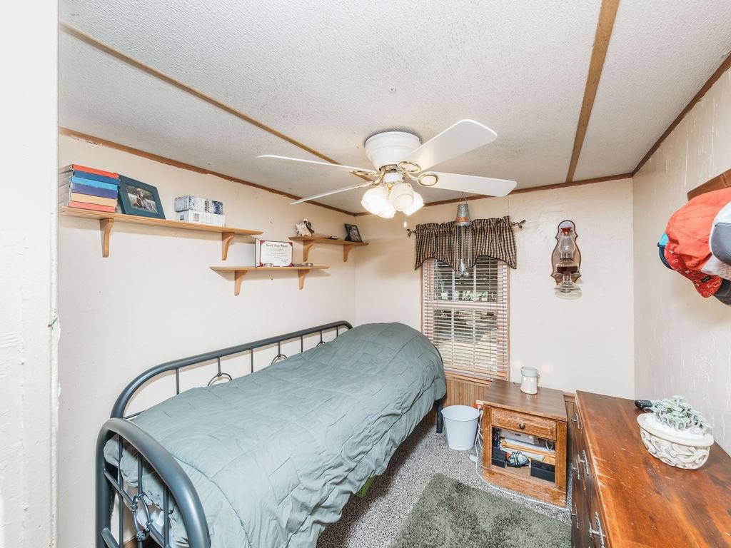 196 Perch Road Bowie, TX 76230 - Photo 19 of 30 a living room with furniture