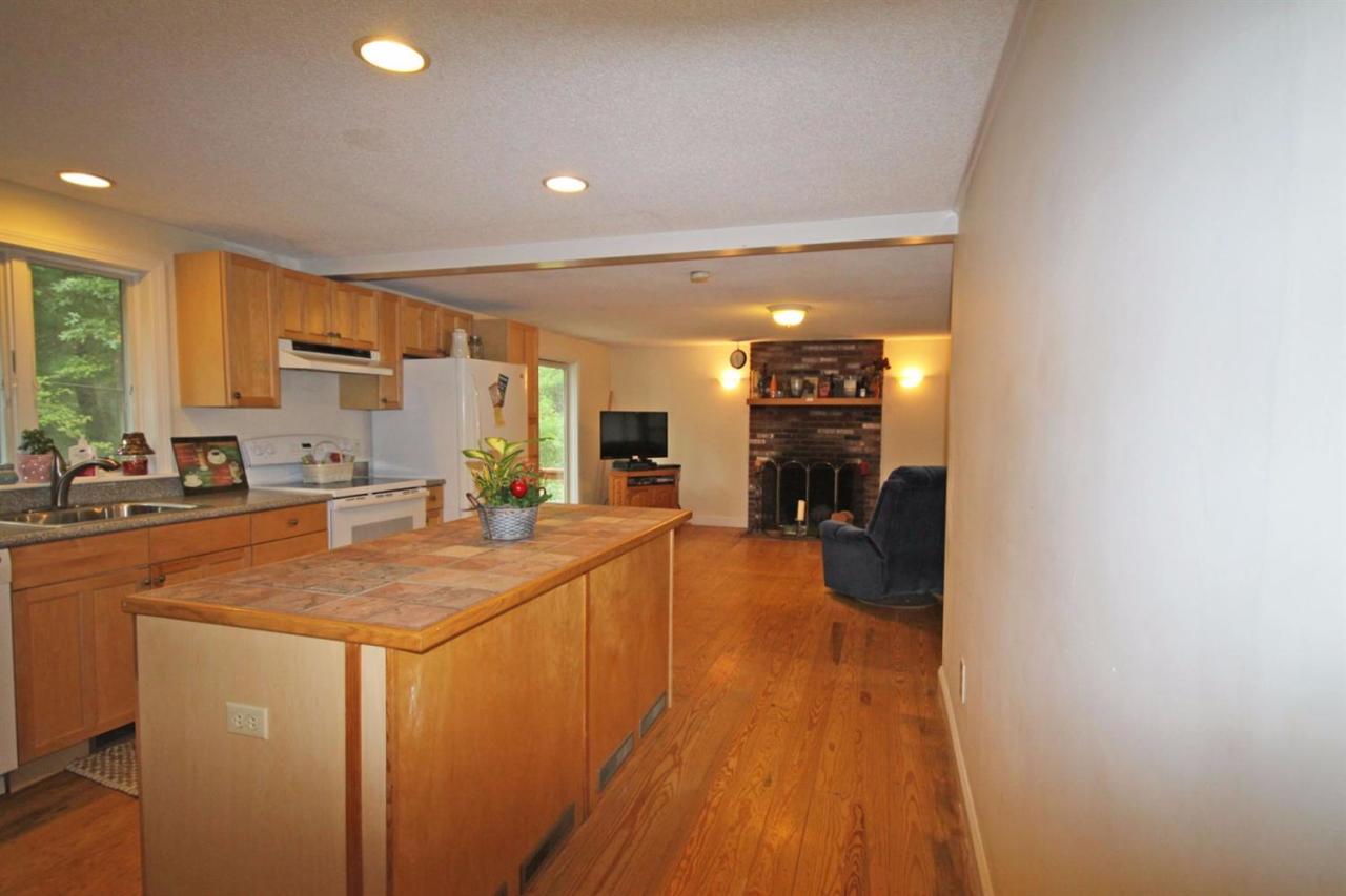 140 Captain Samadrus Road Cotuit, MA 02635 - Photo 7 of 18 a room with sink washer and dryer