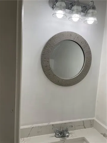 closeup of a sink with a vanity