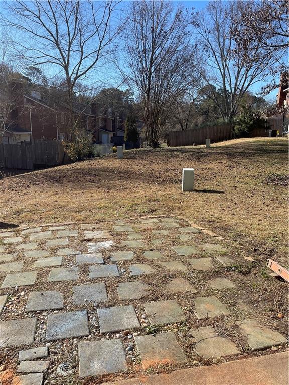 167 Walter Way Stone Mountain, GA 30083 - Photo 21 of 21 a backyard of a house with trees