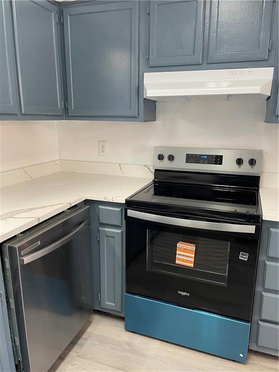 167 Walter Way Stone Mountain, GA 30083 - Photo 7 of 21 a stove top oven sitting inside of a kitchen