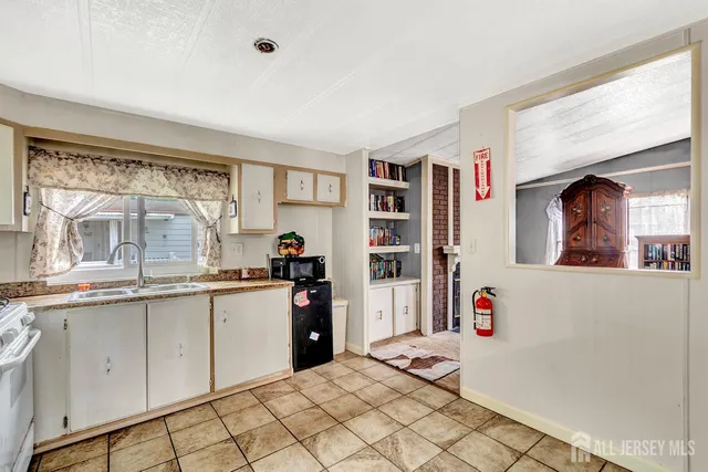 $180,000 | 139 Village Drive West, Spotswood, NJ 08884