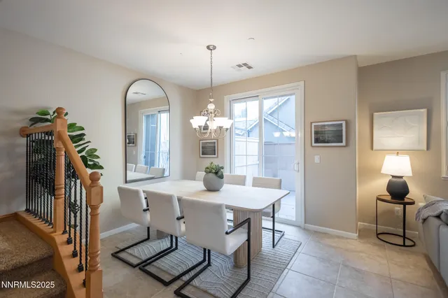 a view of a livingroom with furniture window and wooden floor