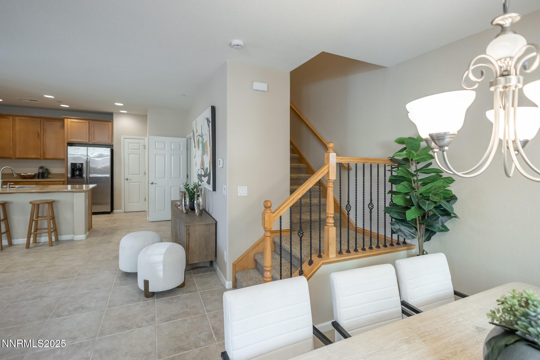 1715 Dark Horse Road, Unit B Reno, NV 89521 - Photo 16 of 39 a living room with furniture and a chandelier