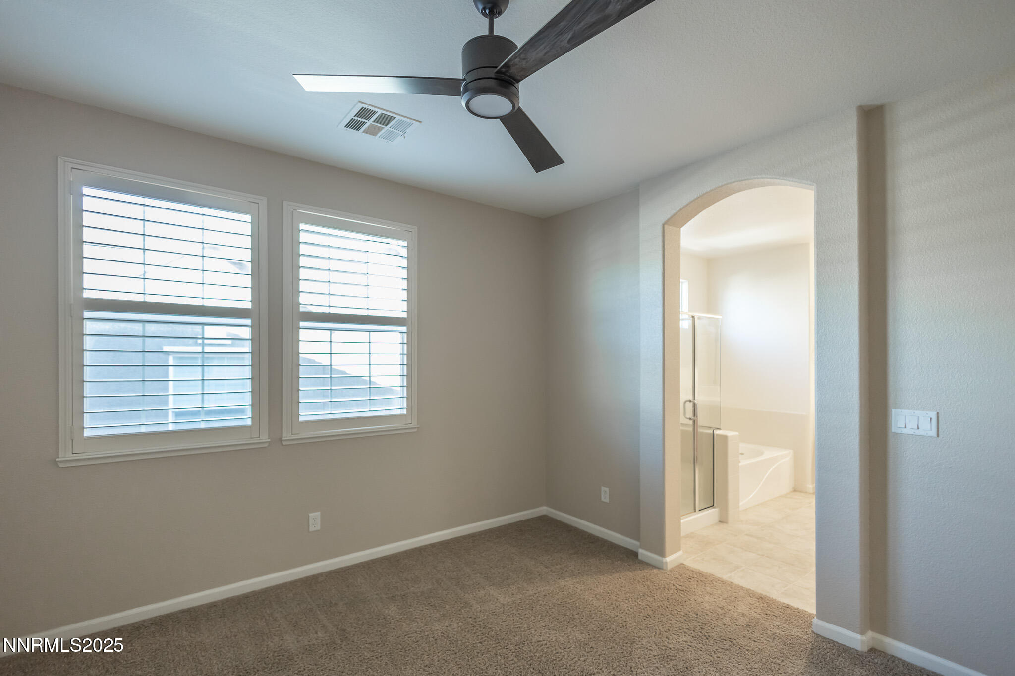 1715 Dark Horse Road, Unit B Reno, NV 89521 - Photo 21 of 39 a view of an empty room with a window