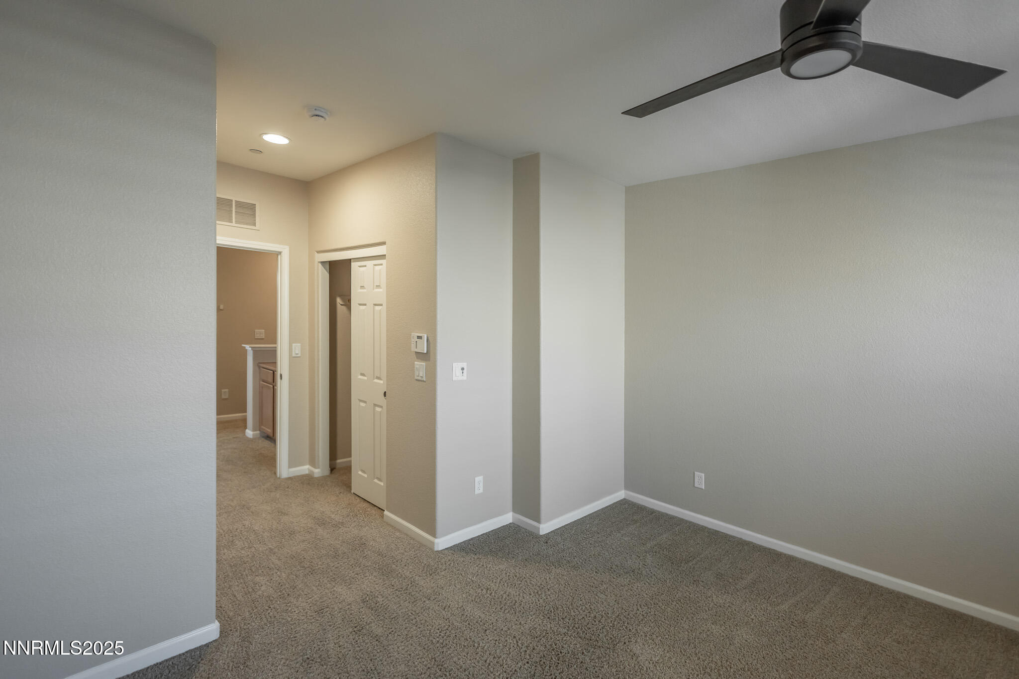 1715 Dark Horse Road, Unit B Reno, NV 89521 - Photo 22 of 39 a view of an empty room and a window