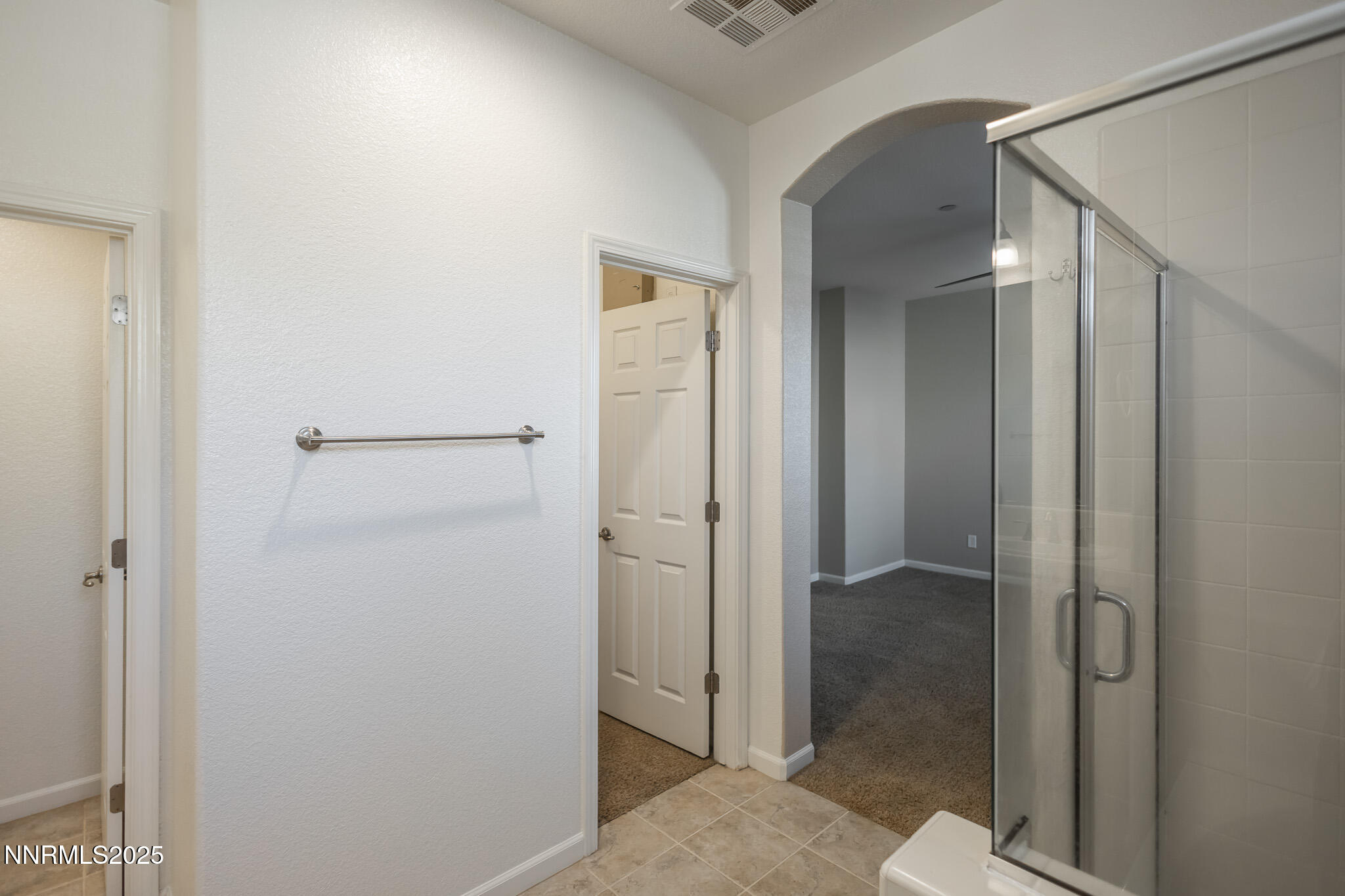 1715 Dark Horse Road, Unit B Reno, NV 89521 - Photo 27 of 39 a bathroom with a shower and toilet