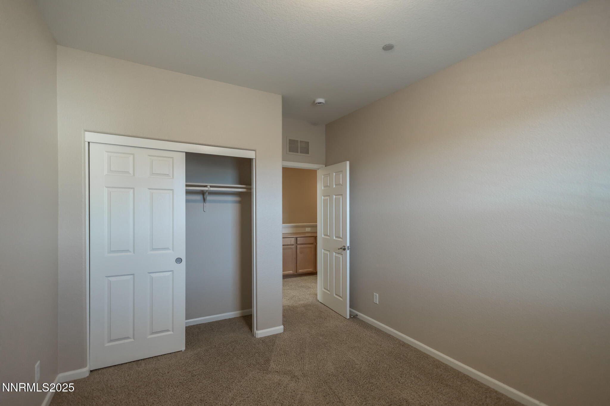 1715 Dark Horse Road, Unit B Reno, NV 89521 - Photo 32 of 39 a view of an empty room