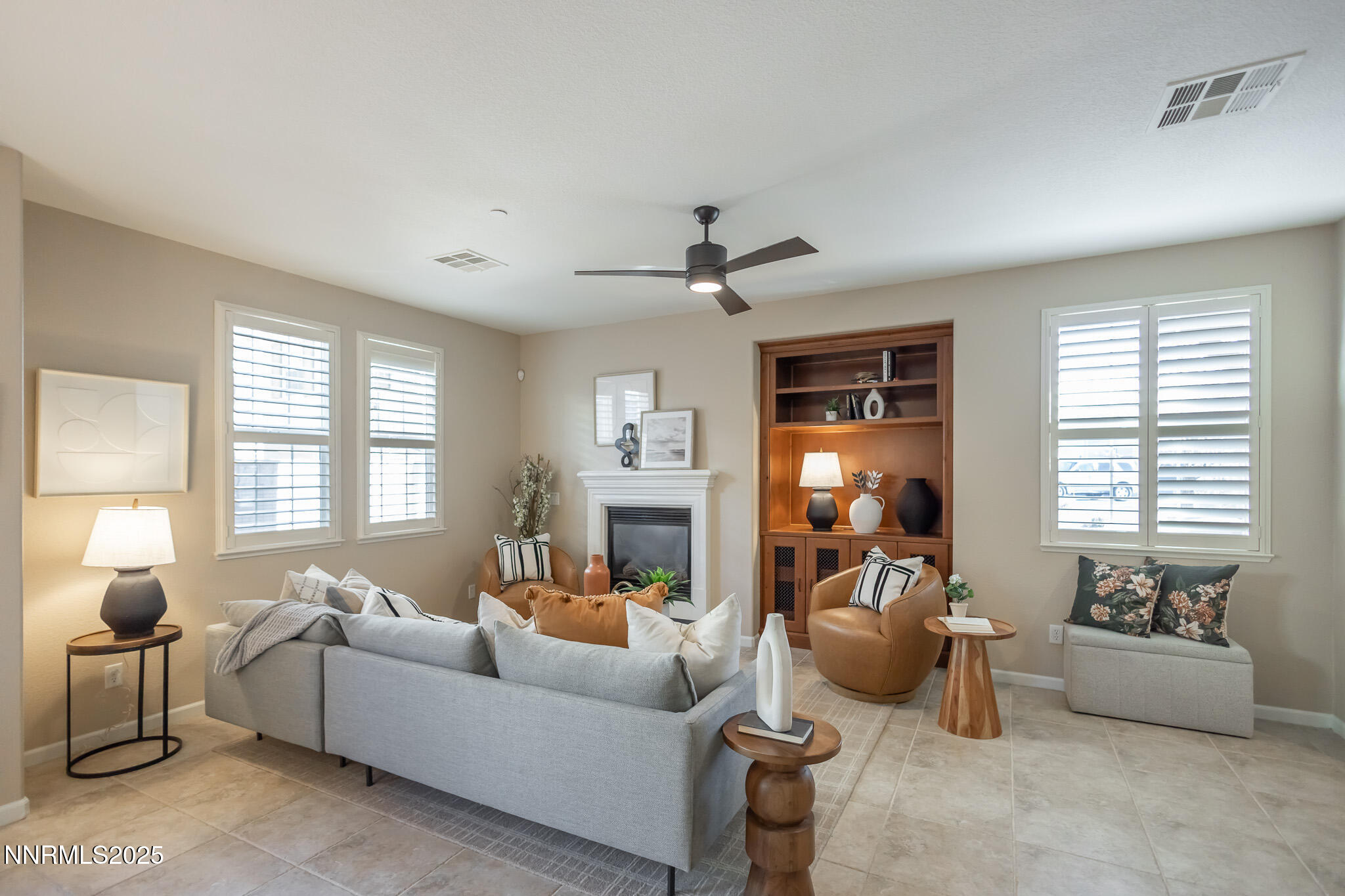 1715 Dark Horse Road, Unit B Reno, NV 89521 - Photo 5 of 39 a living room with furniture fireplace and a large window