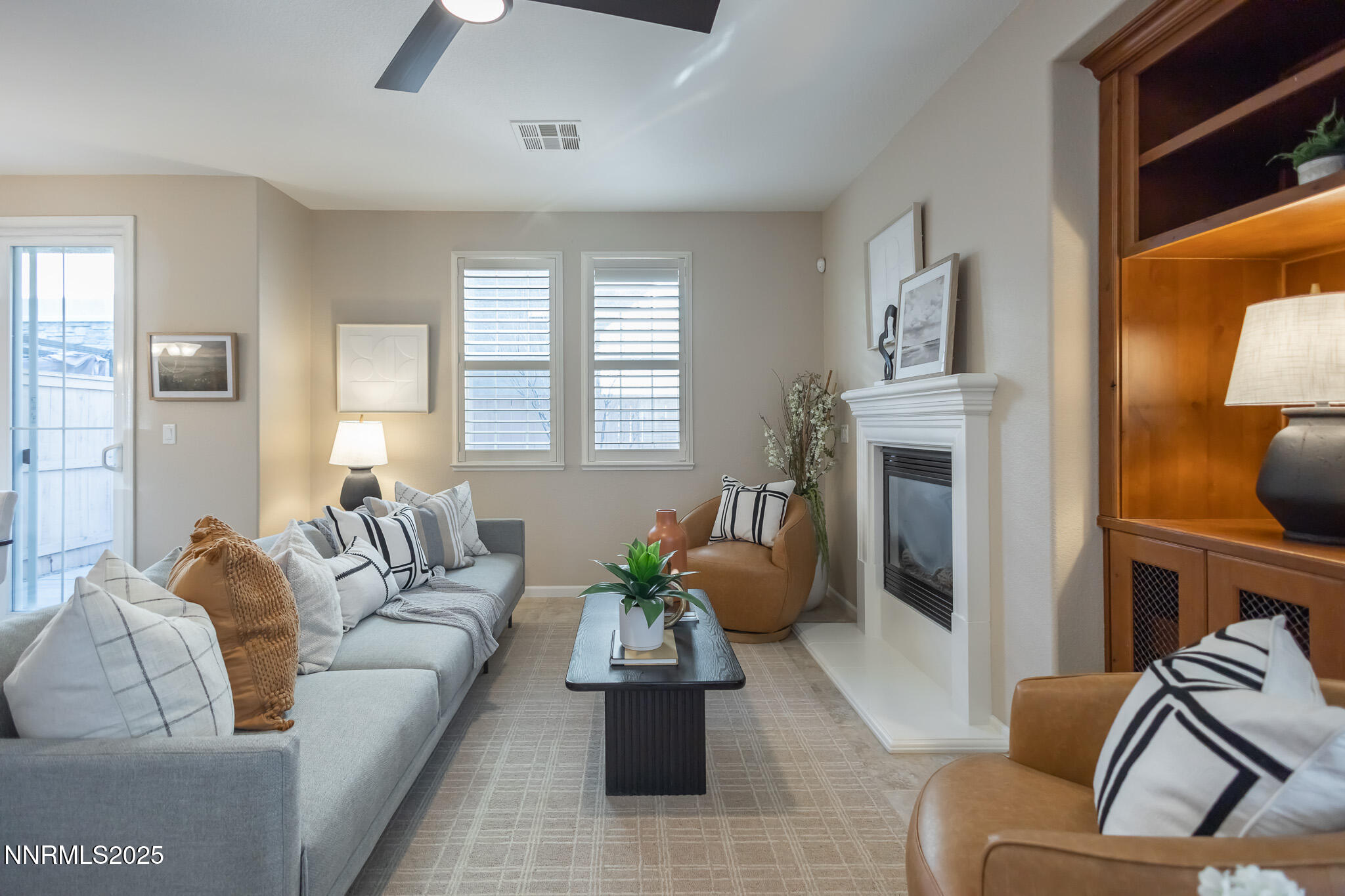 1715 Dark Horse Road, Unit B Reno, NV 89521 - Photo 7 of 39 a living room with furniture and a fireplace