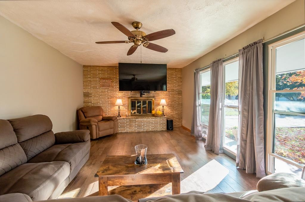 1045 North 2nd Street Rochelle, IL 61068 - Photo 11 of 15 a living room with furniture and a flat screen tv