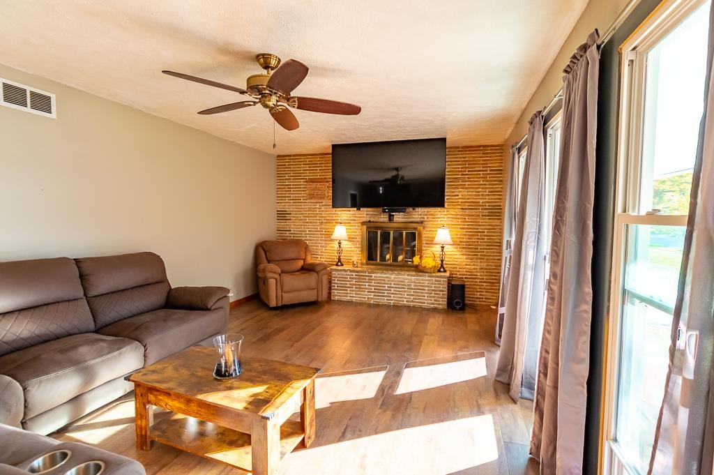 1045 North 2nd Street Rochelle, IL 61068 - Photo 10 of 15 a living room with furniture and a flat screen tv