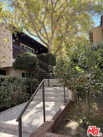 a house view with a backyard