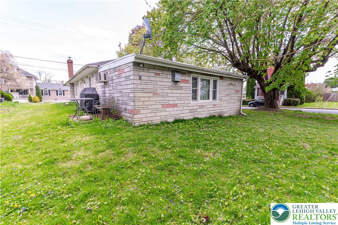 243 East Prospect Street Nazareth, PA 18064 - Photo 24 of 28 a backyard of a house with table and chairs