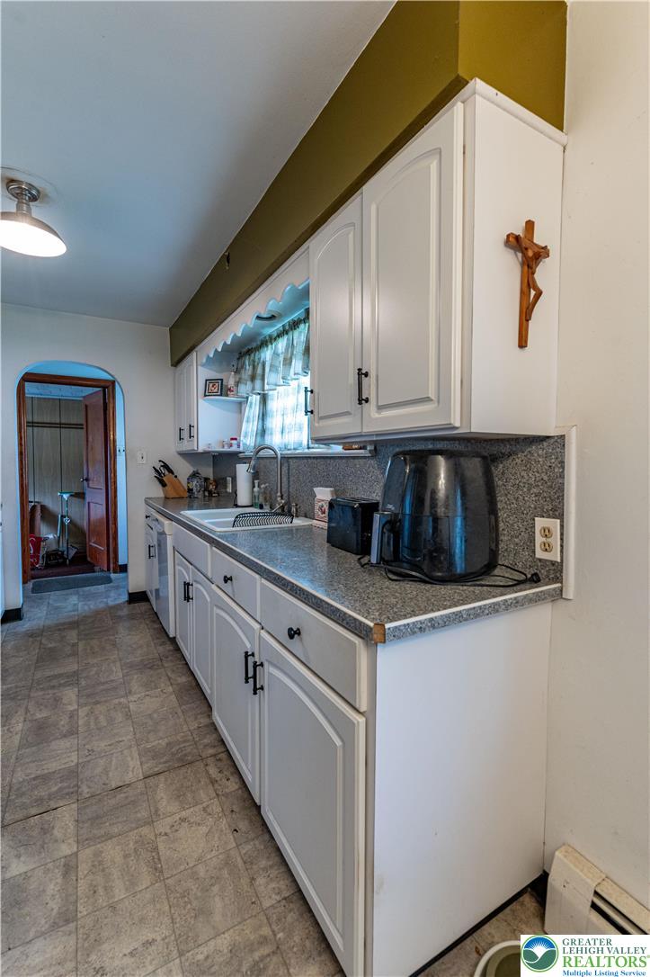 243 East Prospect Street Nazareth, PA 18064 - Photo 10 of 28 a kitchen with stainless steel appliances granite countertop a sink and cabinets