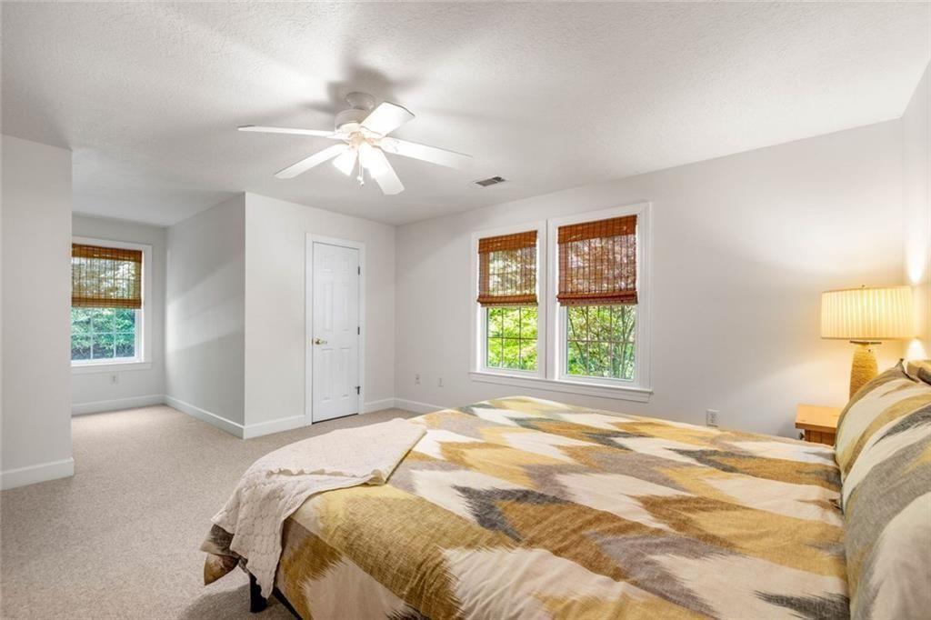 704 Riverbend Road Blairsville, GA 30512 - Photo 57 of 89 a bedroom with a bed and a window