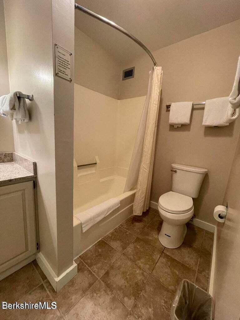 37 Corey Road, Unit 623 Hancock, MA 01237 - Photo 11 of 14 a bathroom with a toilet and a shower