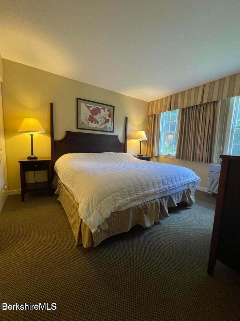 37 Corey Road, Unit 623 Hancock, MA 01237 - Photo 9 of 14 a bedroom with a bed and window