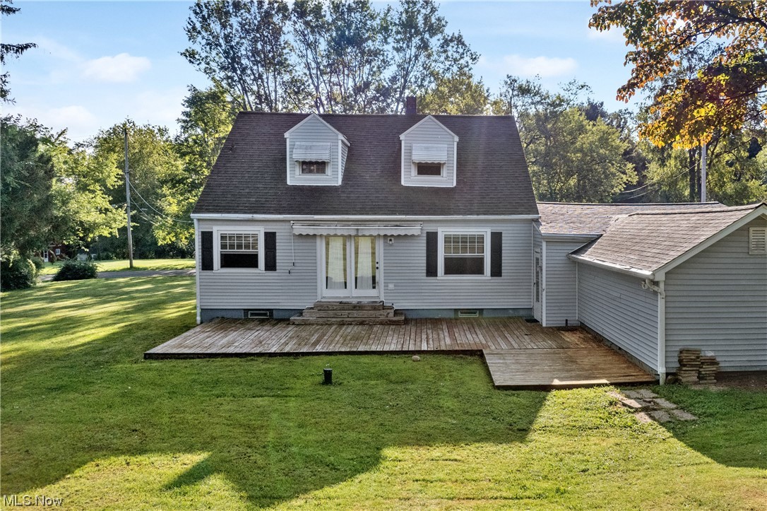 3948 Cox Road Barberton, OH 44203 - Photo 28 of 32 View of back of house featuring a back lawn and a deck
