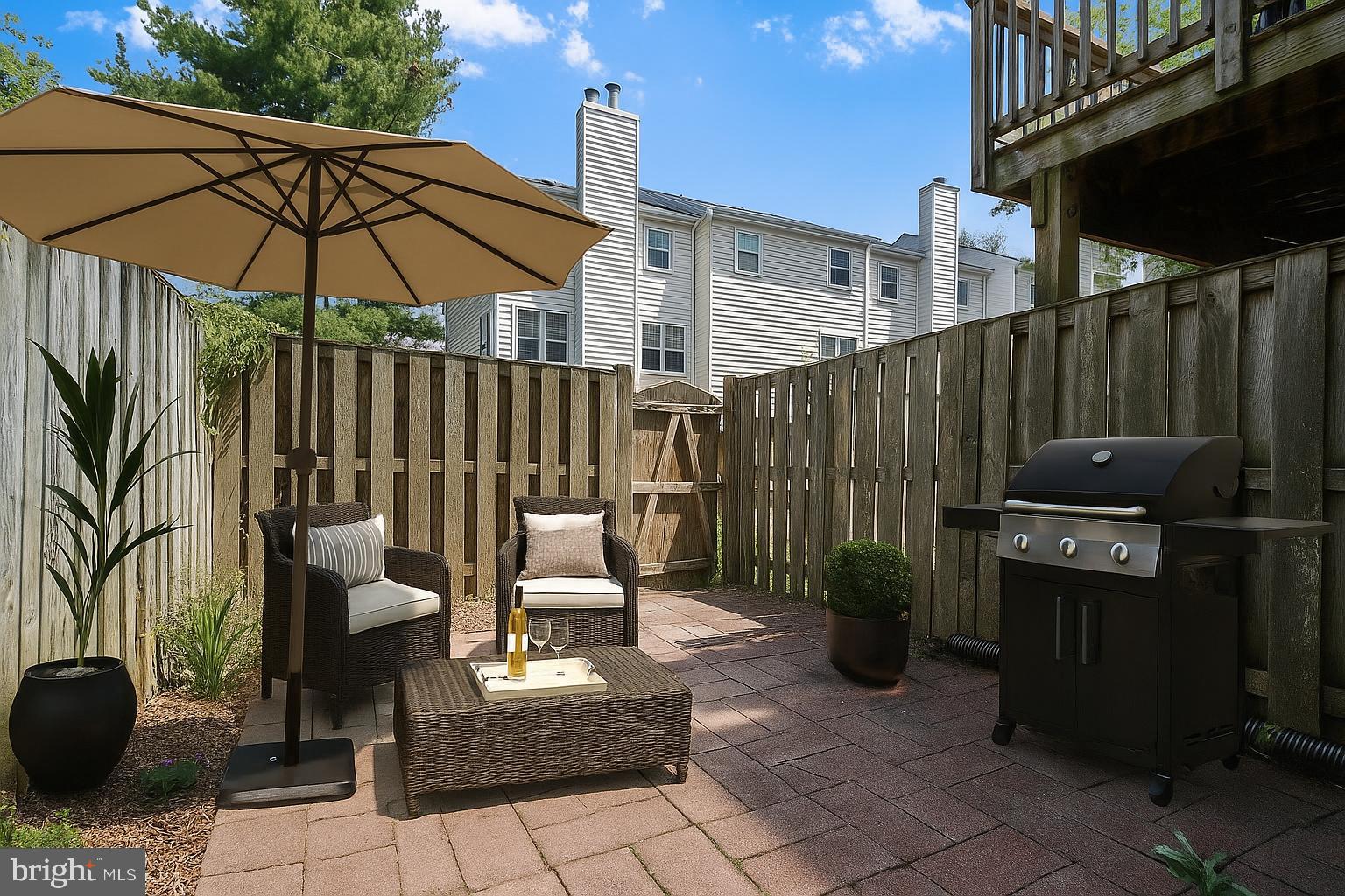 2241 Aberdeen Drive Crofton, MD 21114 - Photo 4 of 37 a view of a chairs and table in the patio
