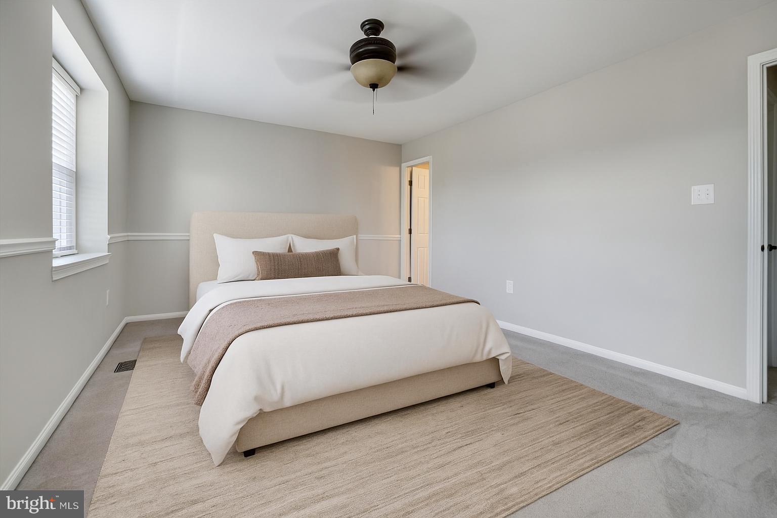 2241 Aberdeen Drive Crofton, MD 21114 - Photo 6 of 37 a bedroom with a bed and window