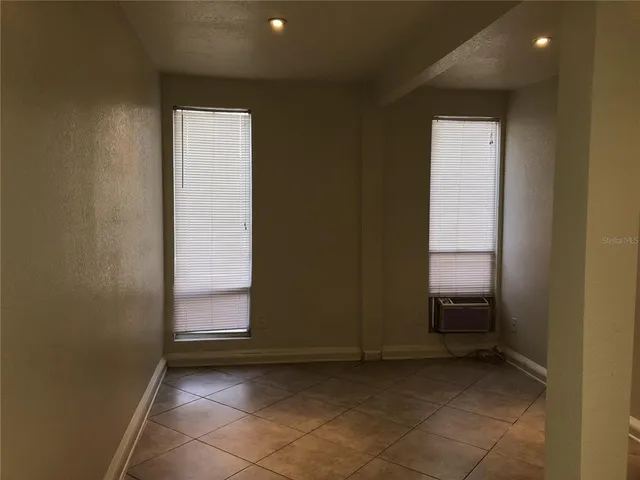 an empty room with windows