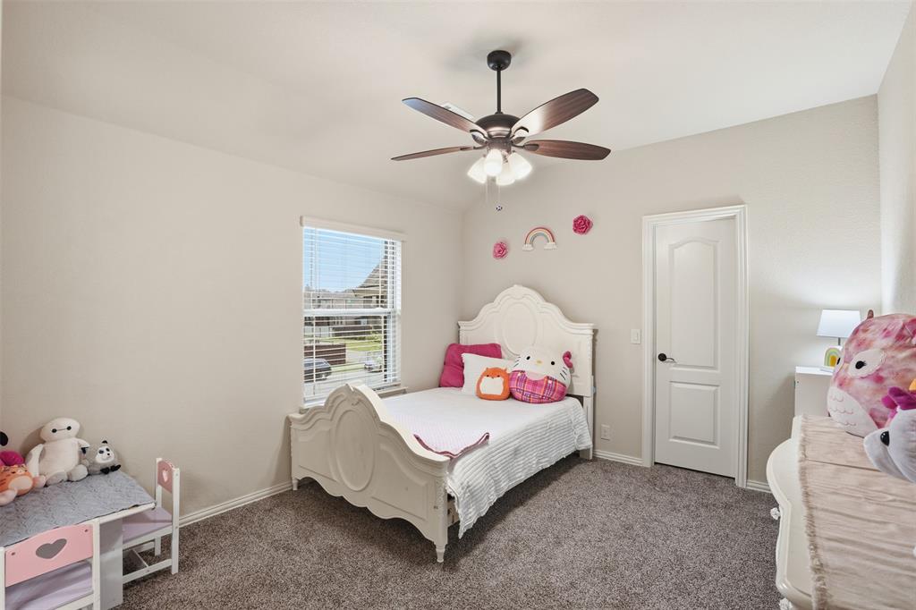 4002 Grove Valley Road Midlothian, TX 76065 - Photo 32 of 40 a bedroom with a bed and a window