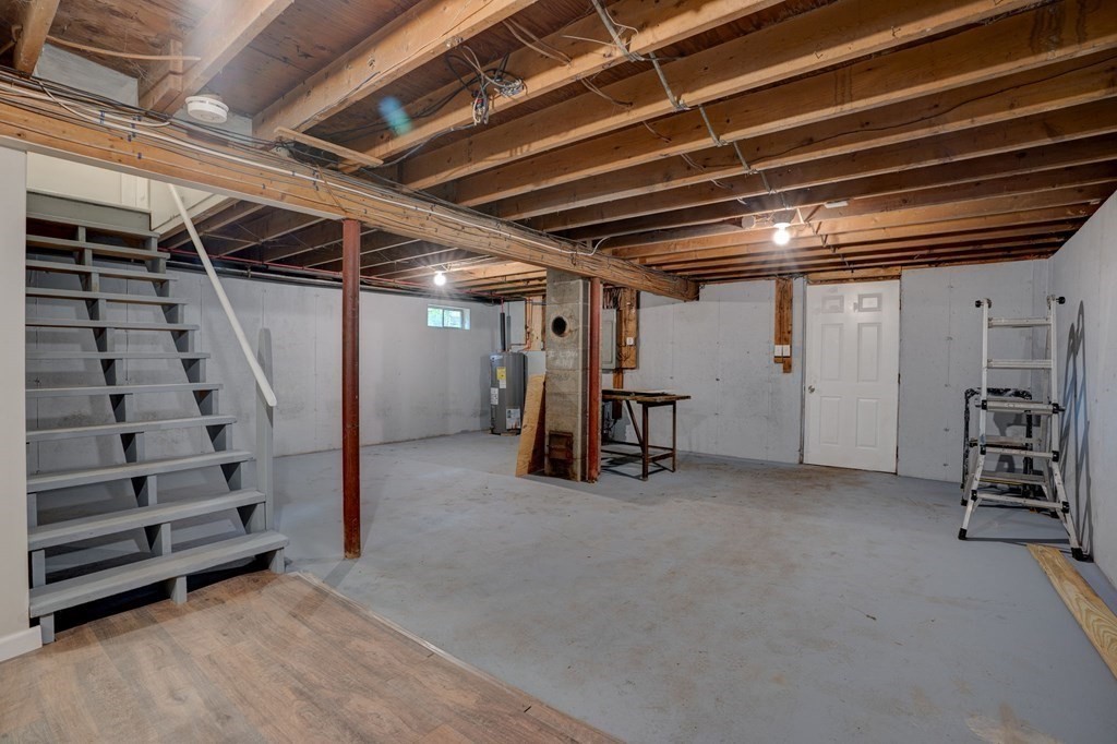 111 Bemis Road Warren, MA 01585 - Photo 20 of 25 a view of empty room with wooden ceiling
