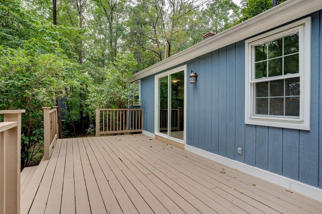 111 Bemis Road Warren, MA 01585 - Photo 3 of 25 a balcony with wooden floor and fence