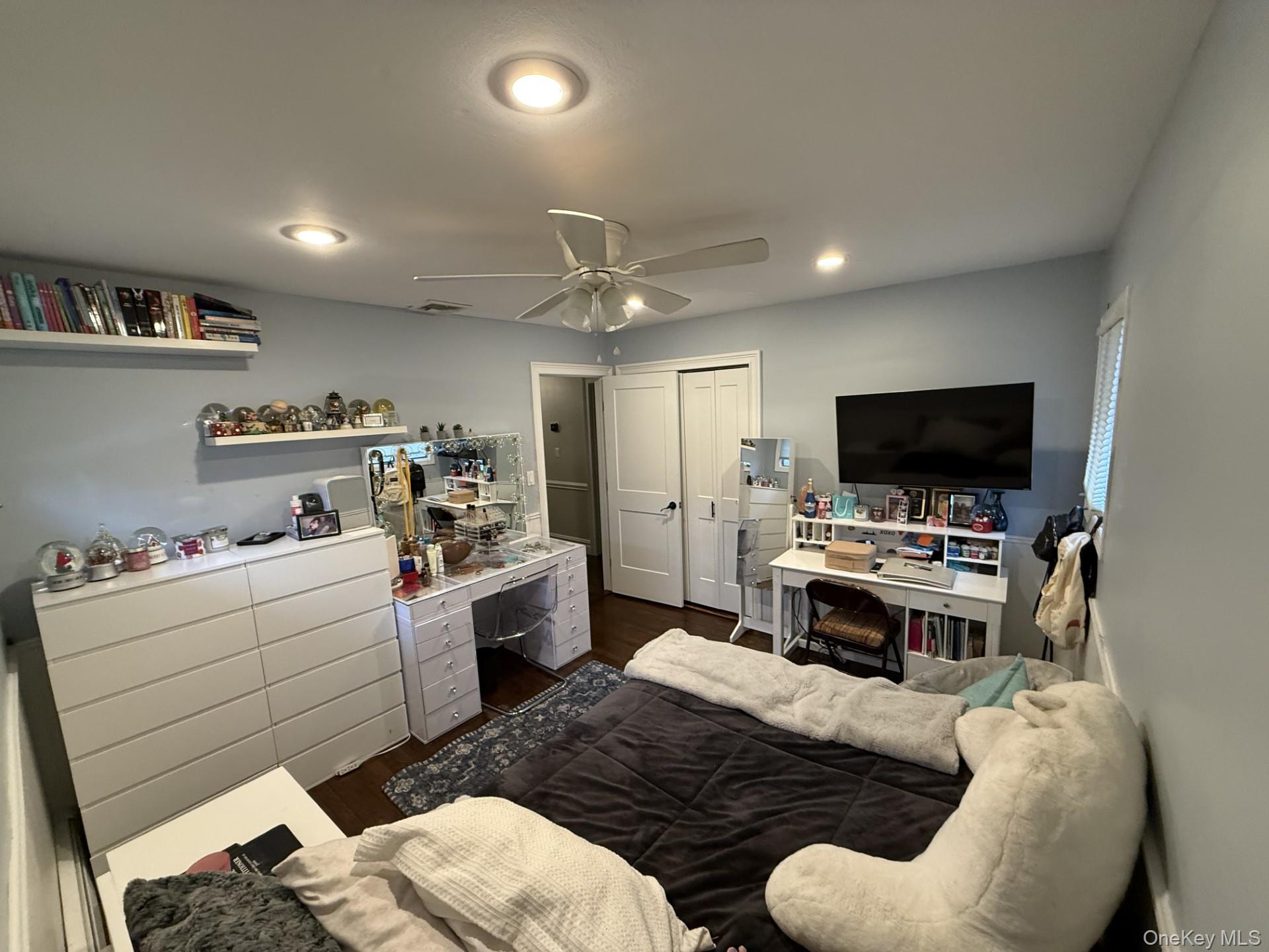 3 Pimlico Court Commack, NY 11725 - Photo 20 of 33 a living room with furniture and a flat screen tv