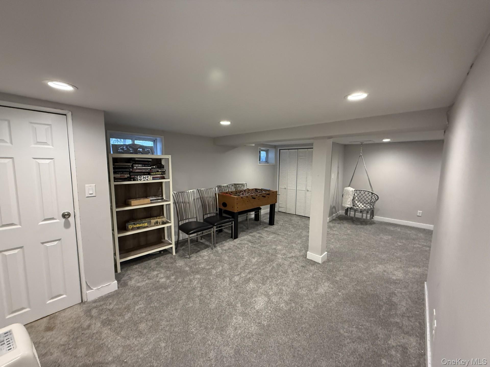 3 Pimlico Court Commack, NY 11725 - Photo 26 of 33 a view of a livingroom with furniture and storage