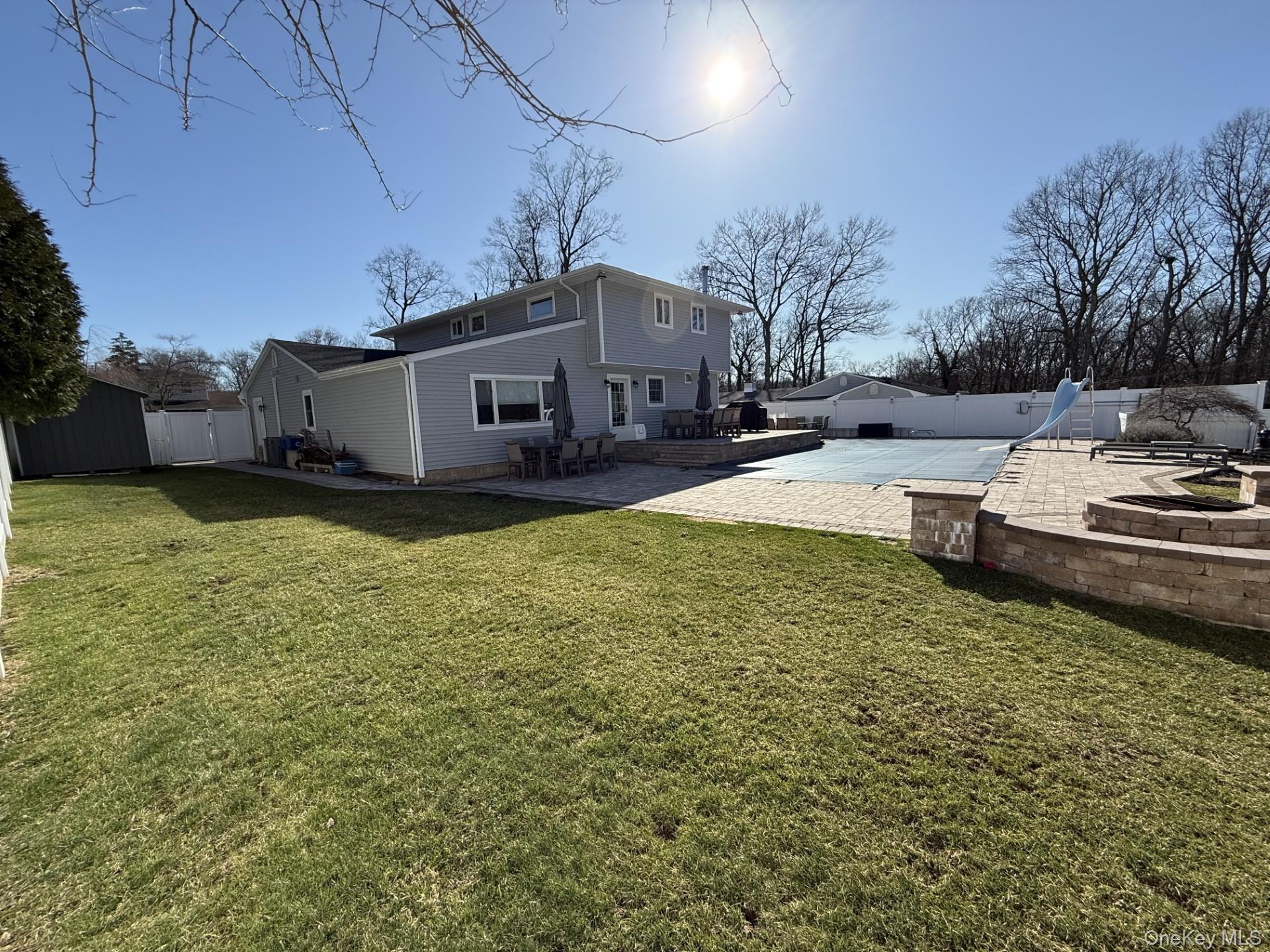 3 Pimlico Court Commack, NY 11725 - Photo 28 of 33 a view of a house with a yard