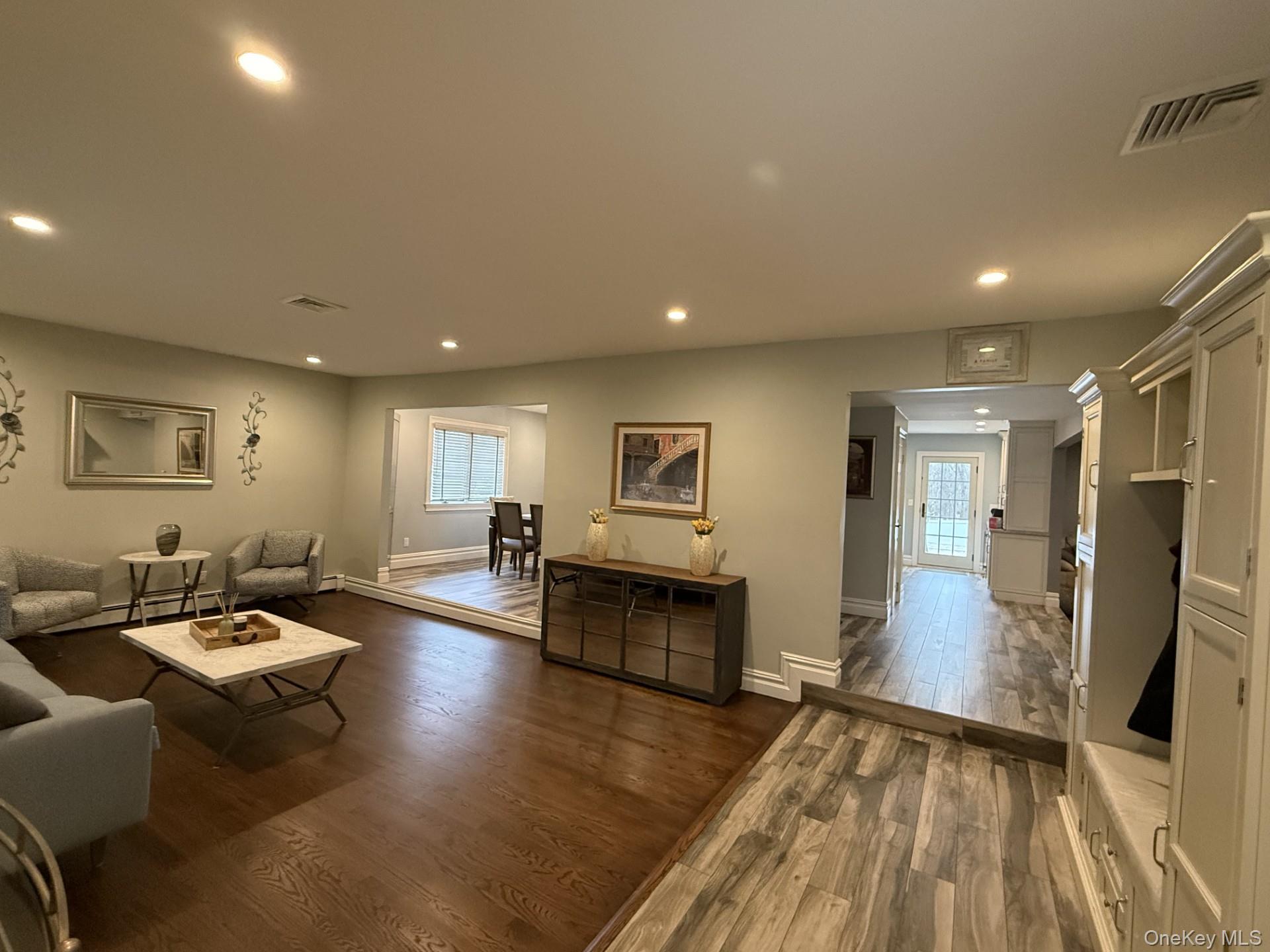3 Pimlico Court Commack, NY 11725 - Photo 3 of 33 a living room with furniture and a wooden floor