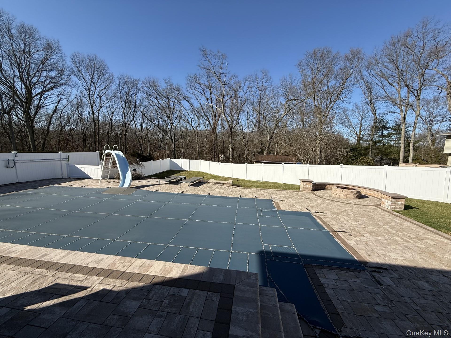 3 Pimlico Court Commack, NY 11725 - Photo 31 of 33 a view of a backyard with sitting area