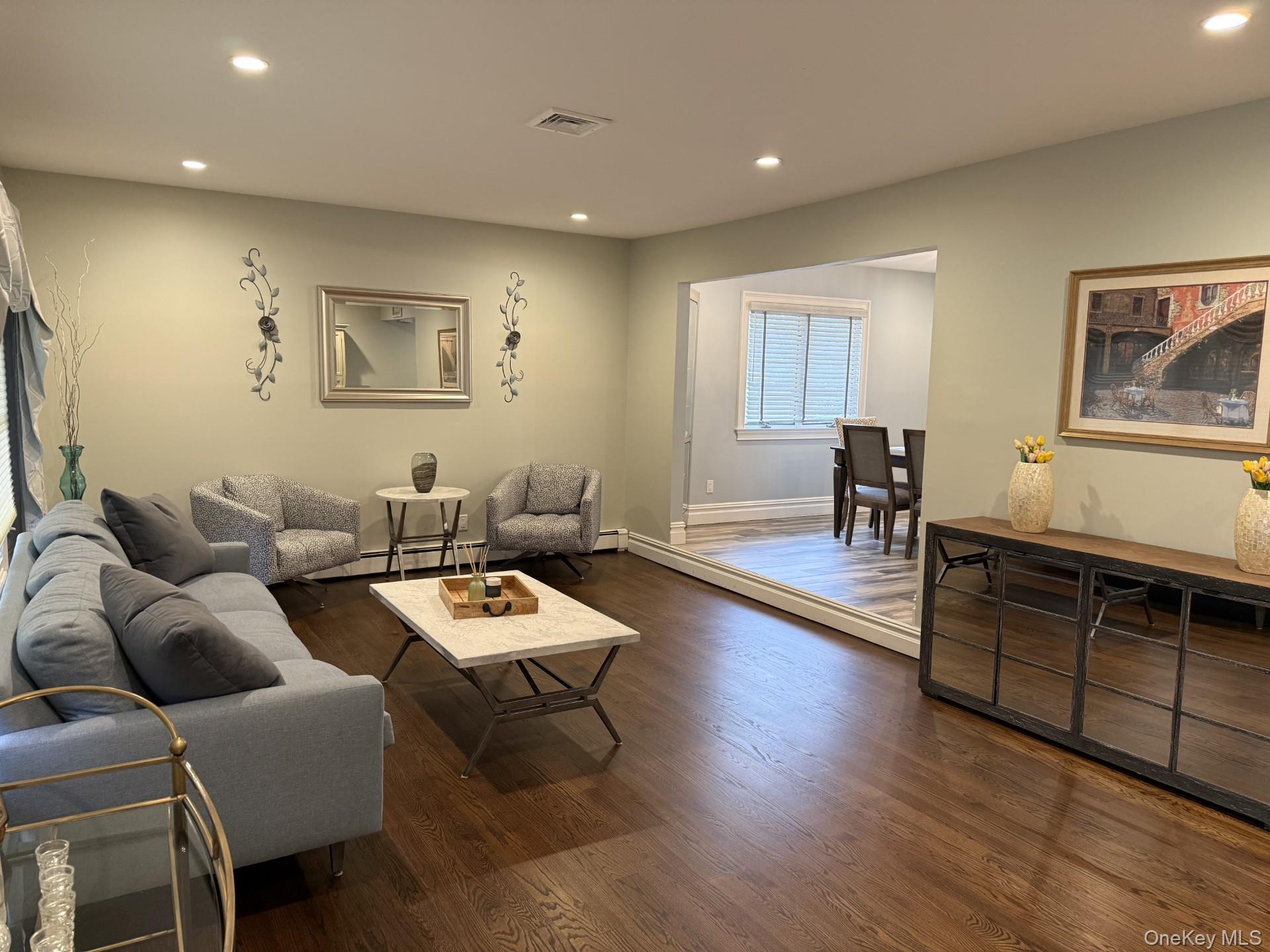 3 Pimlico Court Commack, NY 11725 - Photo 8 of 33 a living room with furniture and a wooden floor