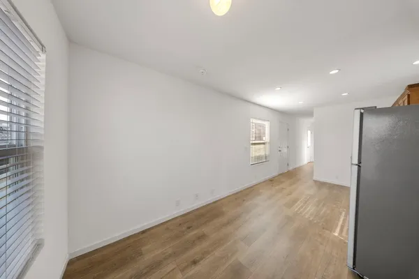 a view of an empty room and window