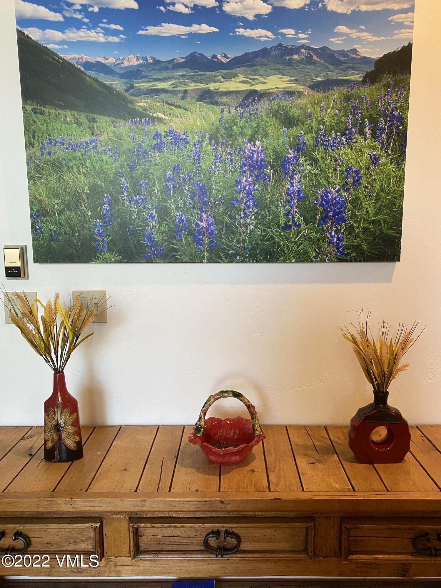 178 Knudson Ranch Road Edwards, CO 81632 - Photo 6 of 26 a view of a floor to ceiling window and an umbrella