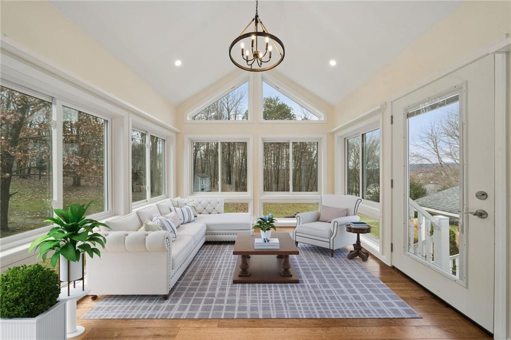 317 Ann Circle Indiana, PA 15701 - Photo 15 of 39 a living room with furniture floor to ceiling window and wooden floor