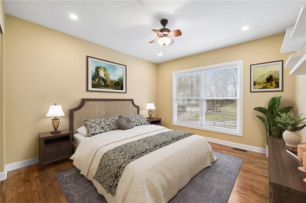 317 Ann Circle Indiana, PA 15701 - Photo 16 of 39 a bedroom with a bed and a painting on the wall